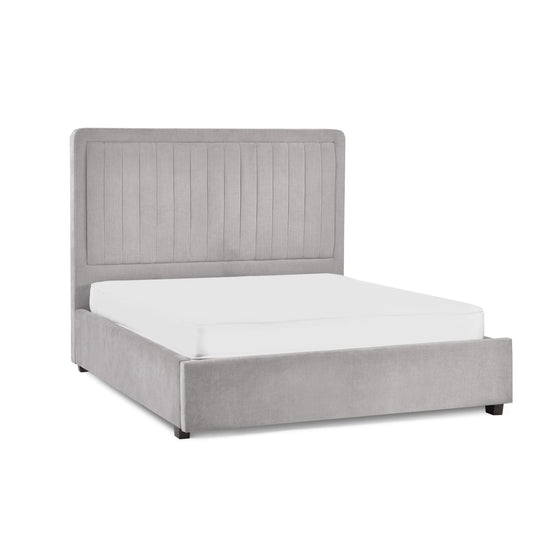 Gray upholstered bed with white mattress on a white background