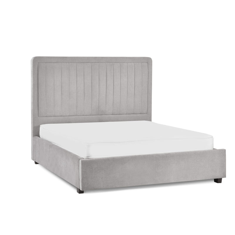 Gray upholstered bed with white mattress on a white background