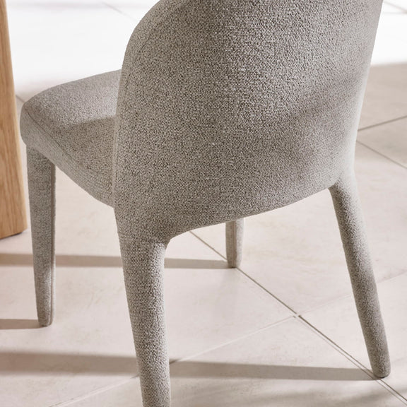 Gray textured chair on a light wooden floor