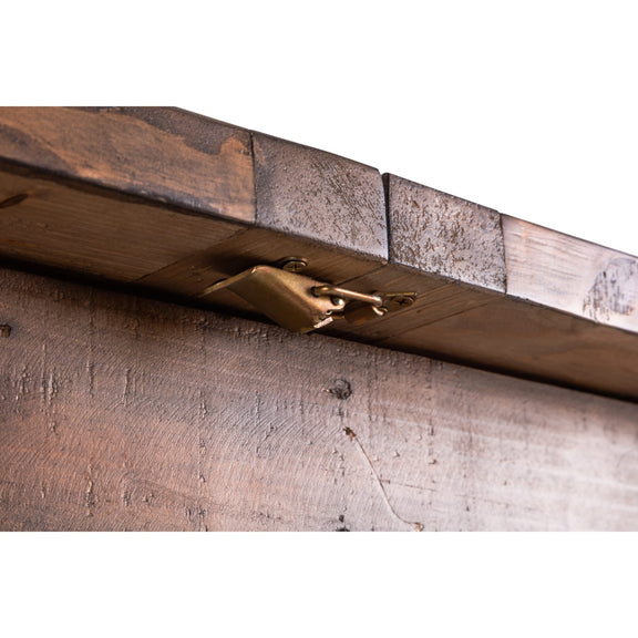 Close-up of wooden beams with a metal bracket on a white background