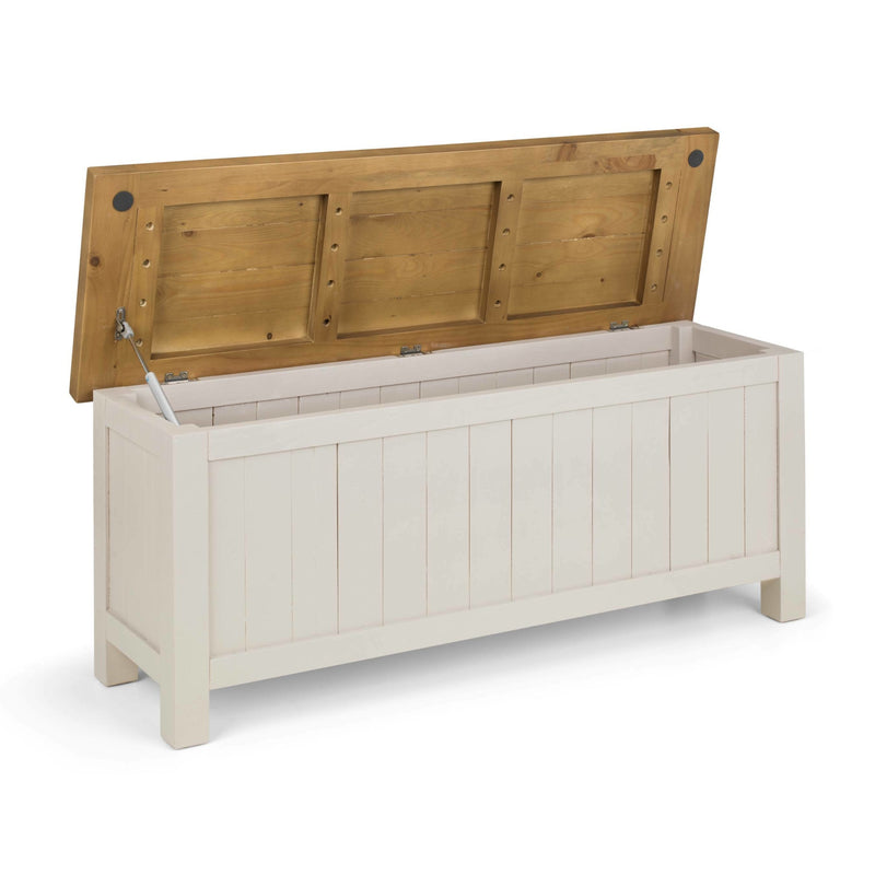 Wooden storage bench with a white base and wooden lid on a white background