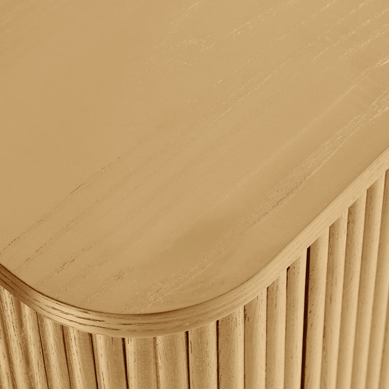 Close-up of a wooden surface with a ribbed edge
