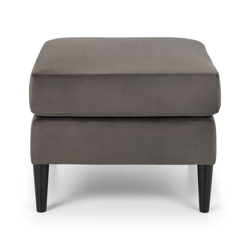Gray upholstered ottoman with black legs on a white background