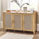 Wooden sideboard with wicker doors in a room with a window and decor items.