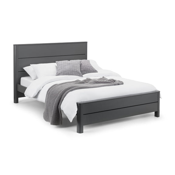Gray wooden bed with white bedding and gray blanket on a white background