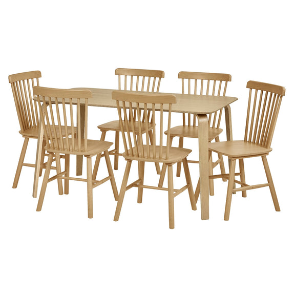 Wooden dining table with six matching chairs on a white background