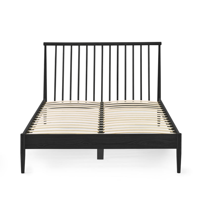 Black metal bed frame with wooden slats on a white background