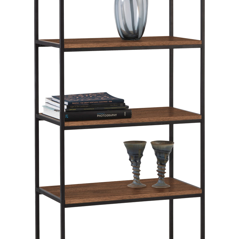 Bookshelf with wooden shelves and black metal frame, displaying books and decorative items on a white background.
