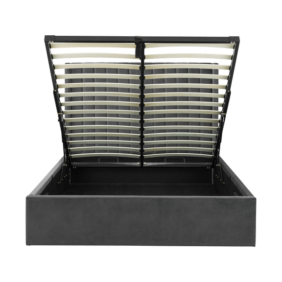 Black metal bed frame with open headboard on a white background