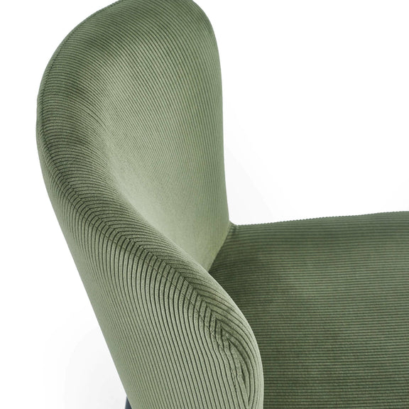 Close-up of a green textured chair armrest on a white background