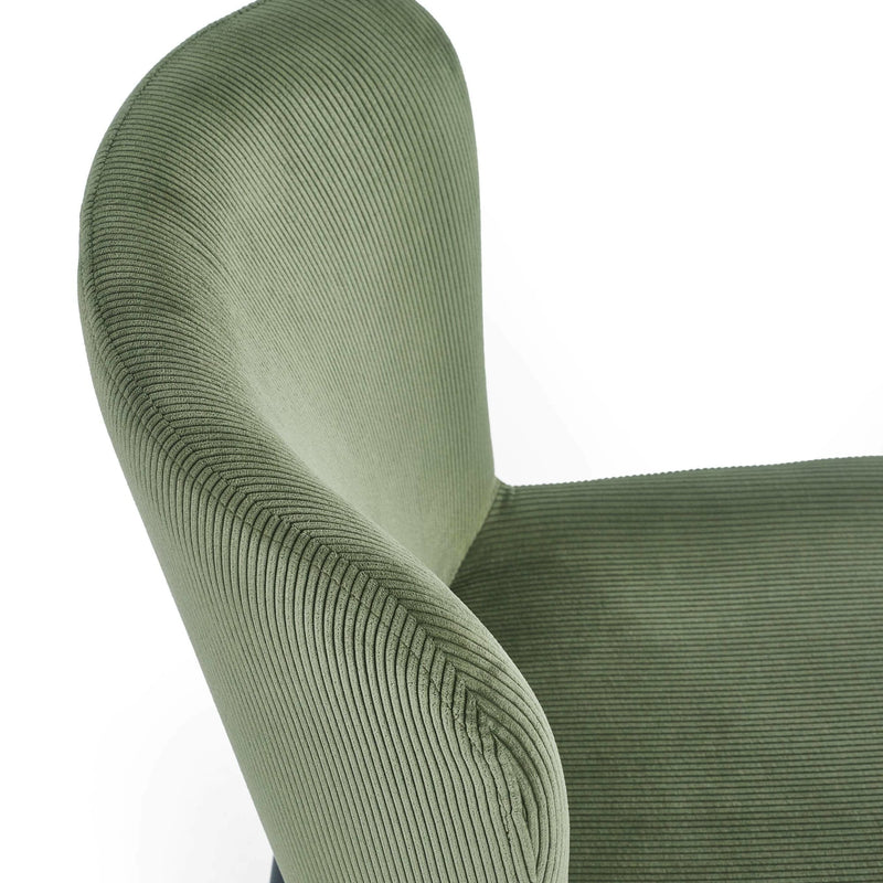Close-up of a green textured chair armrest on a white background