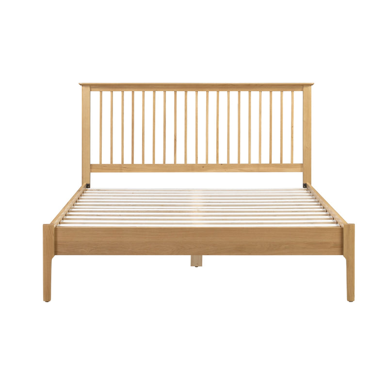 Wooden bed frame with slatted design on a white background