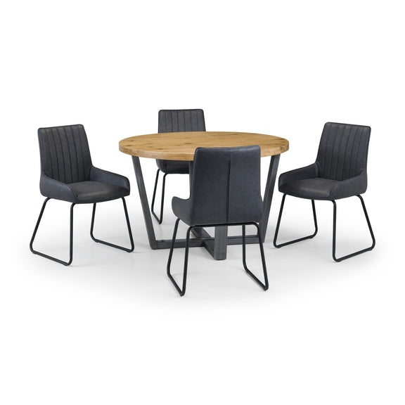 Round wooden table with four black chairs on a white background