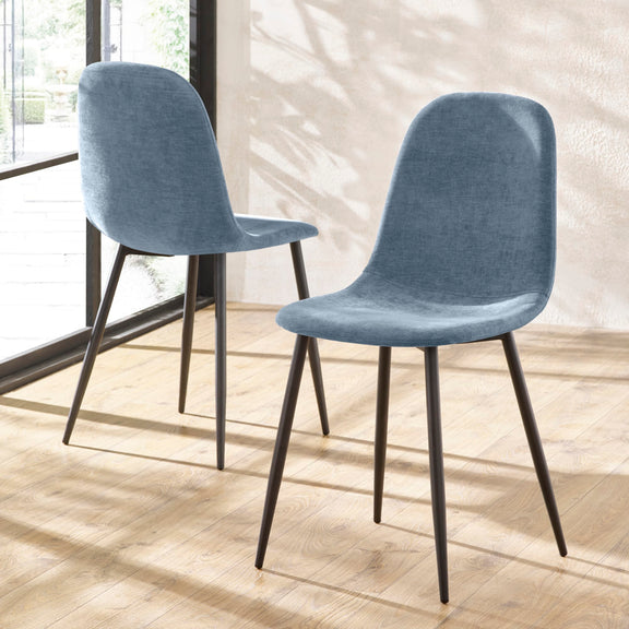 Two blue chairs with black legs on a wooden floor.