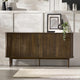 Wooden sideboard in a modern interior setting with decor elements.
