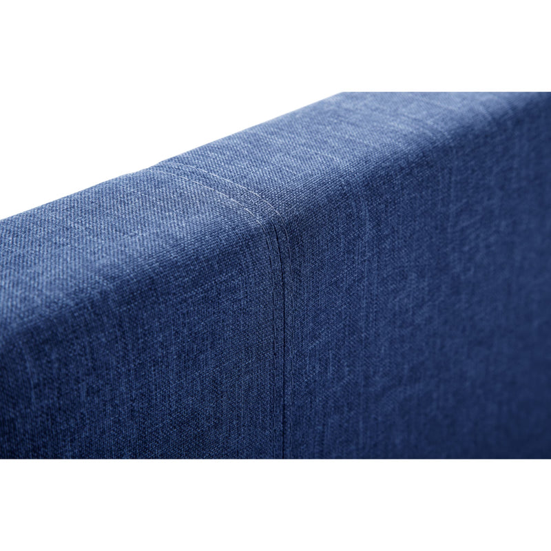 Close-up of a blue fabric surface with a subtle pattern on a white background