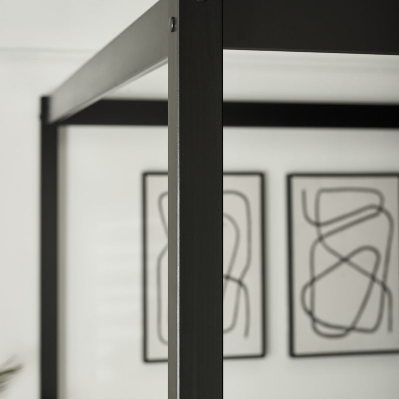 Modern black shelving unit with abstract wall art in a minimalistic room.