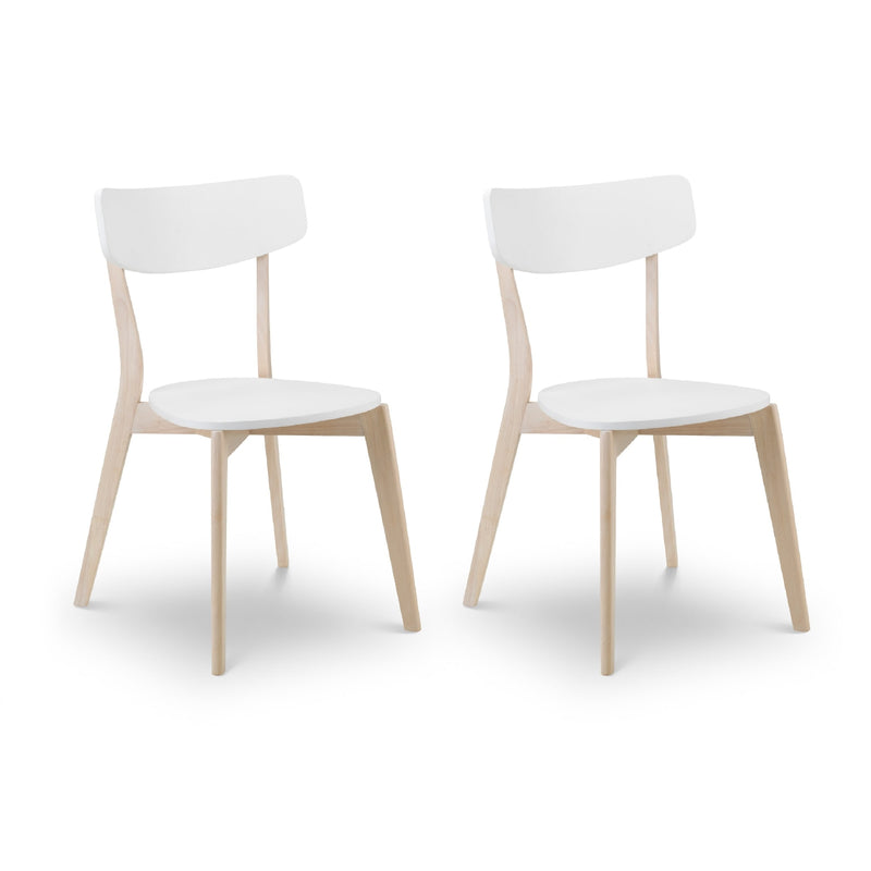 Two white chairs with light wood legs on a white background