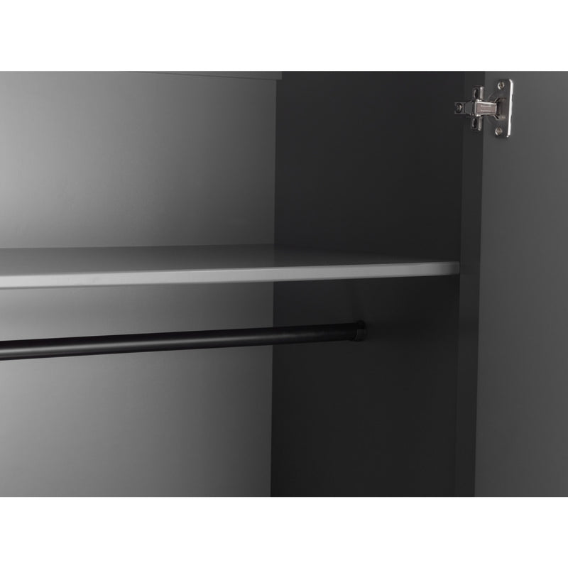 Close-up of a kitchen cabinet with a metallic finish and visible hinge.