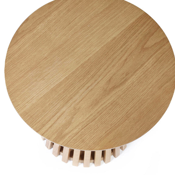 Wooden coaster with circular design on a white background