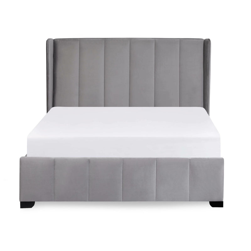 Gray upholstered bed with white mattress on a light gray background