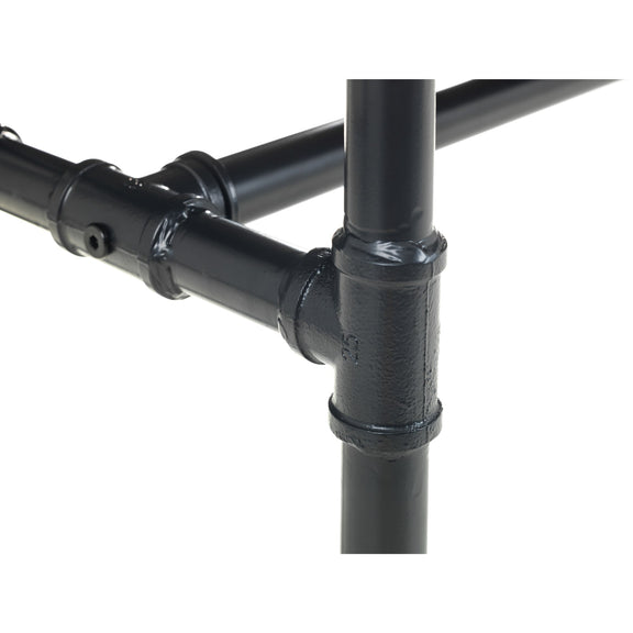 Close-up of black metal pipes on a white background