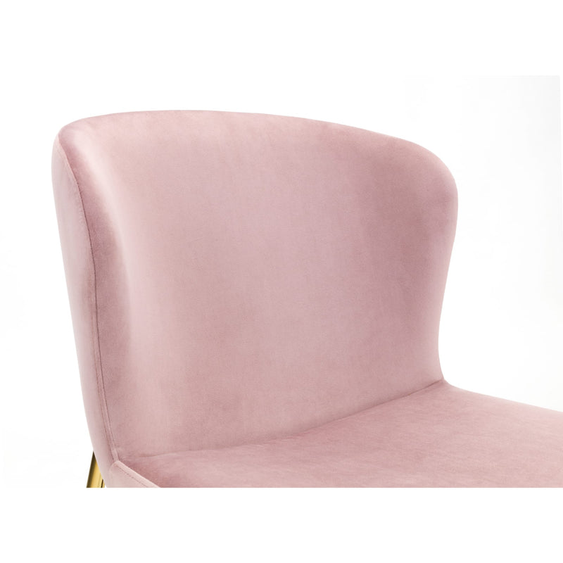 Pink velvet chair on a white background