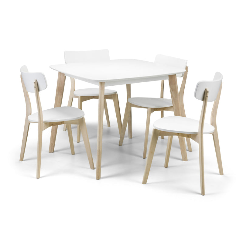 Dining set with a white table and chairs on a white background