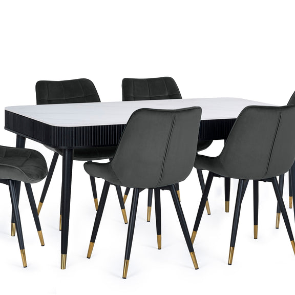 Dining table with black chairs on a white background
