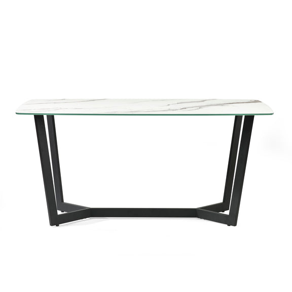 Dining table with marble-like top and black metal frame on a white background
