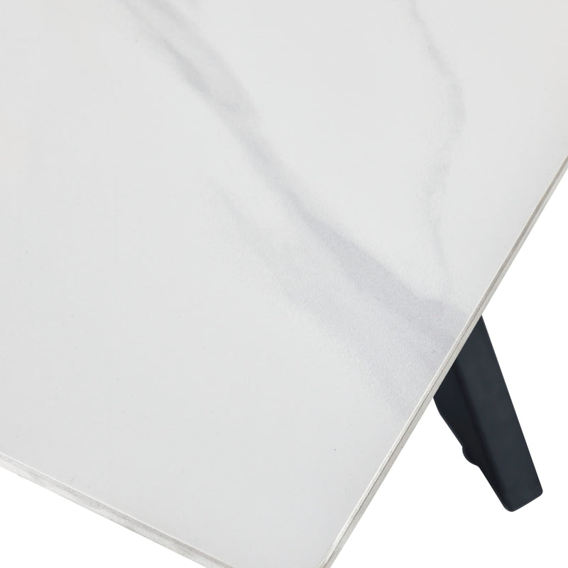 Close-up of a white ceiling panel with a black trim on a white background
