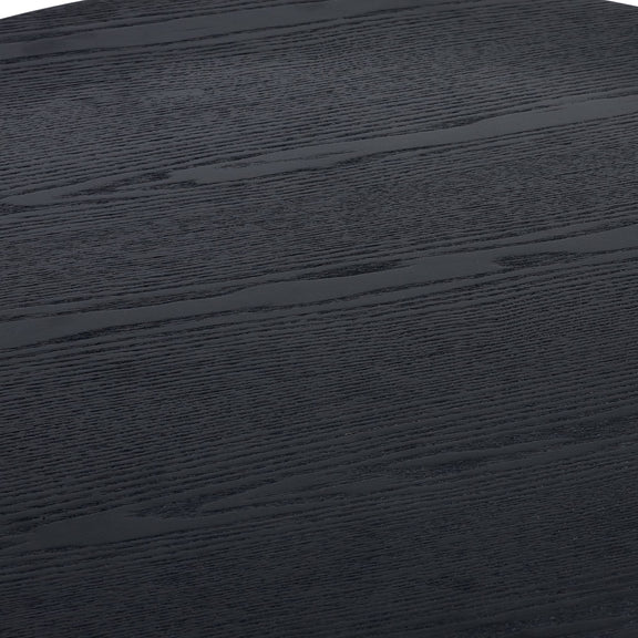 Close-up of a dark wooden surface with visible grain.