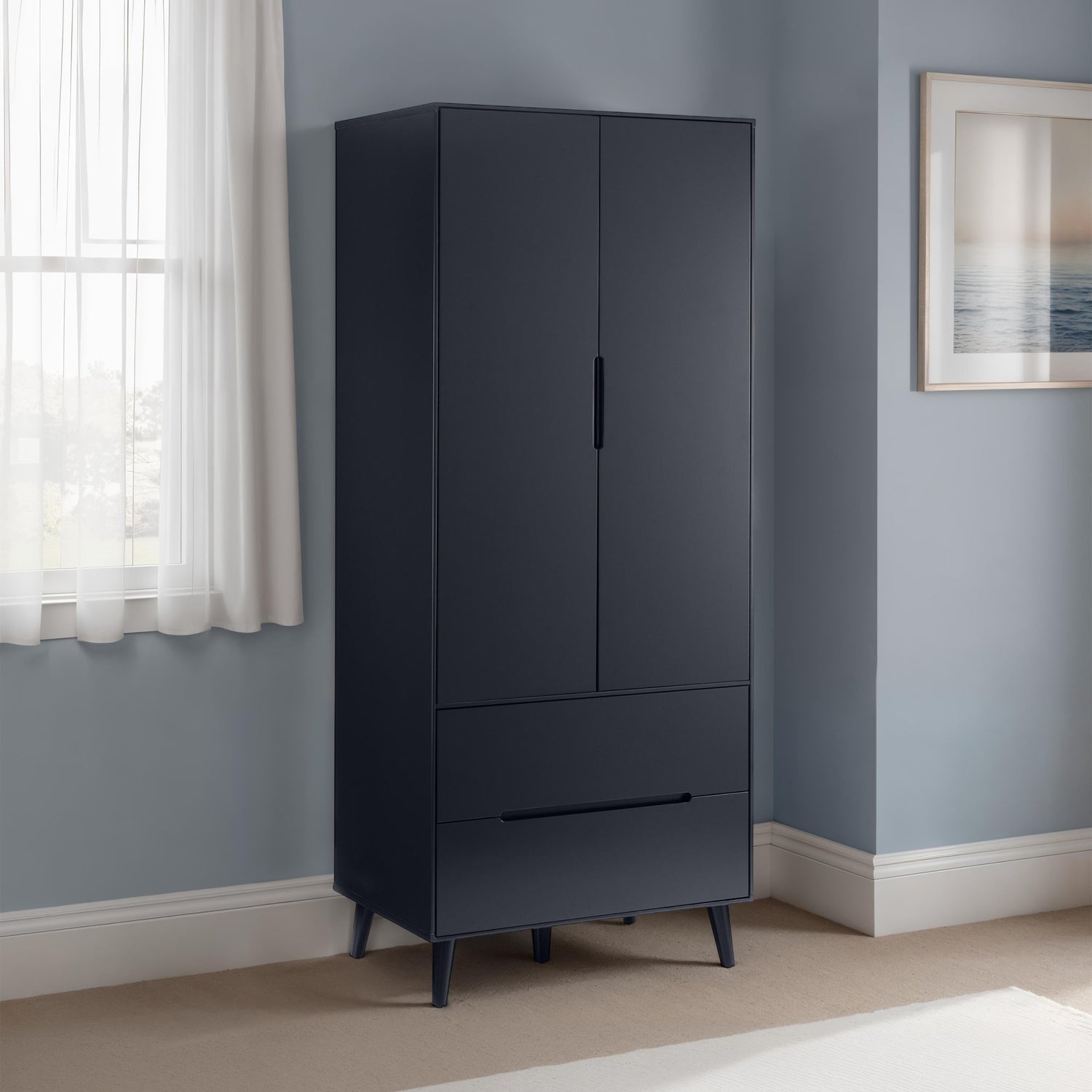 Black wardrobe with two doors and two drawers against a light blue wall.