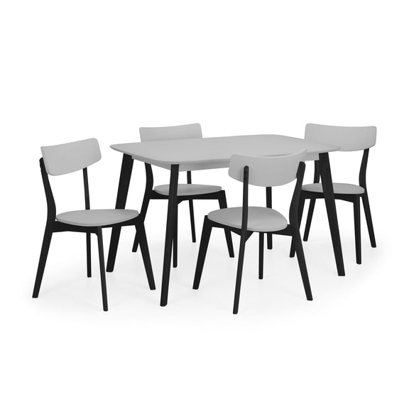 Dining table set with four chairs on a white background