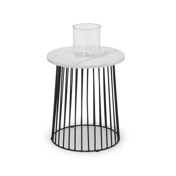 Small round table with a white marble top and black metal base on a white background
