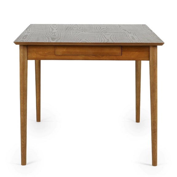 Wooden table with a textured gray top on a white background