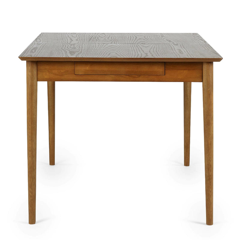 Wooden table with a textured gray top on a white background