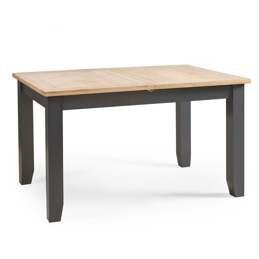 Rectangular table with wooden top and dark gray base on a white background
