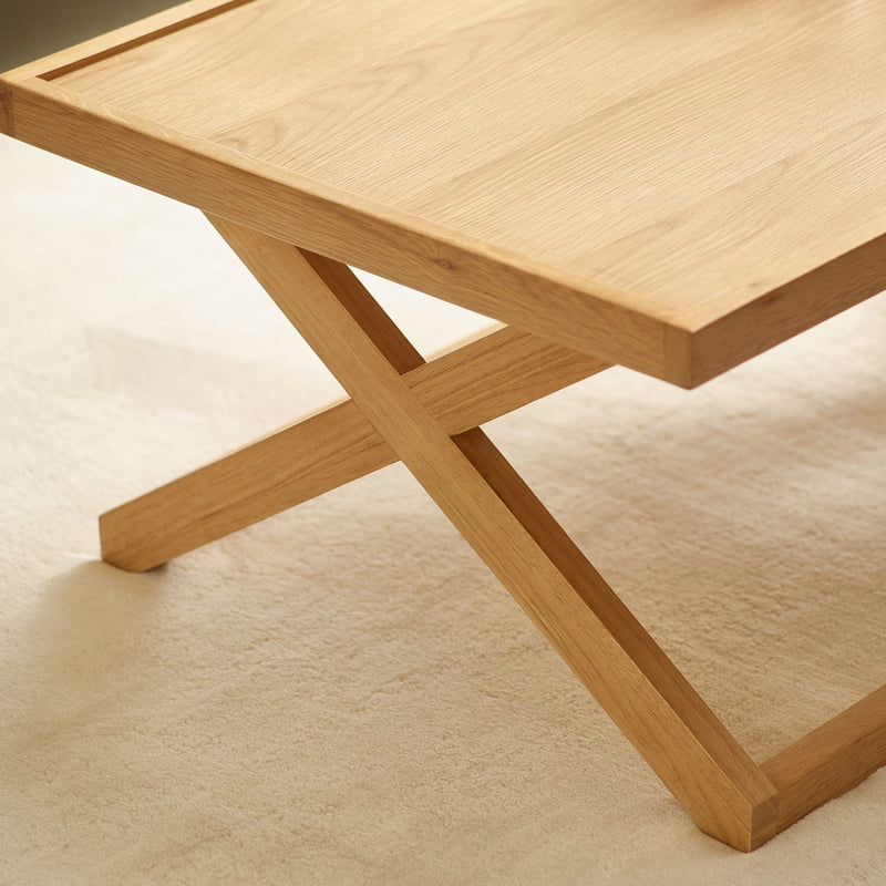 Wooden table with a minimalist design on a light background