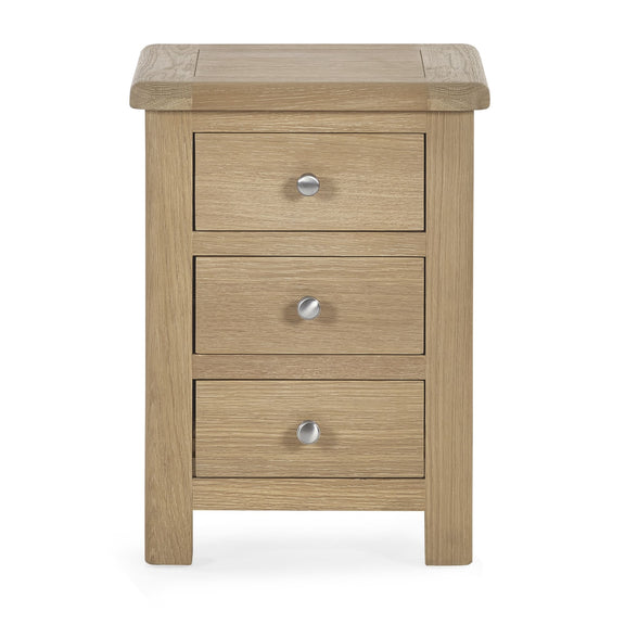 Wooden nightstand with three drawers on a white background