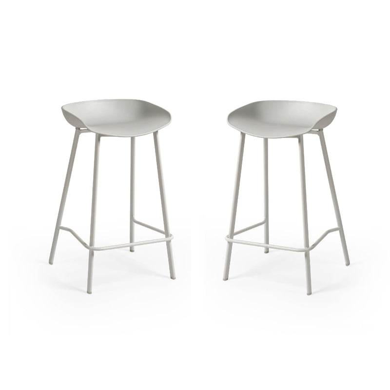 Two white bar stools on a white background
