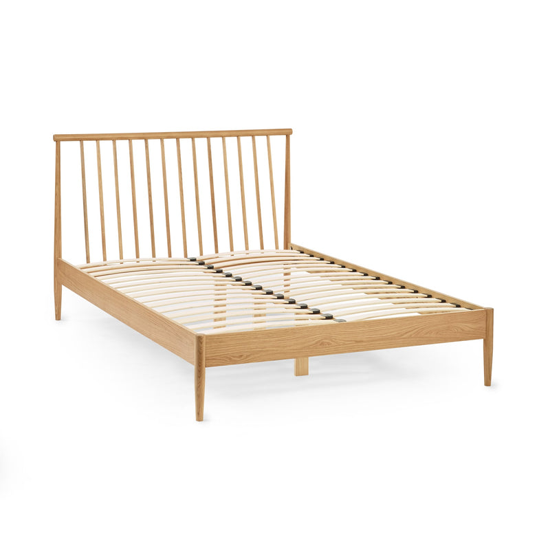 Wooden bed frame on a white background
