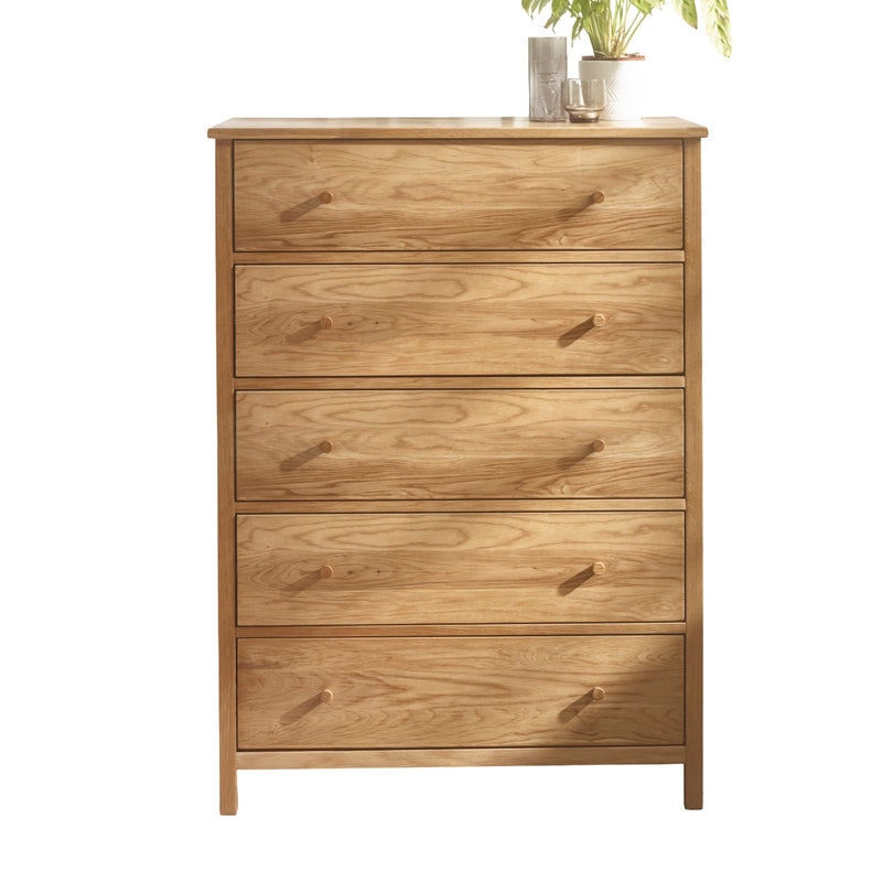Wooden dresser with four drawers on a white background