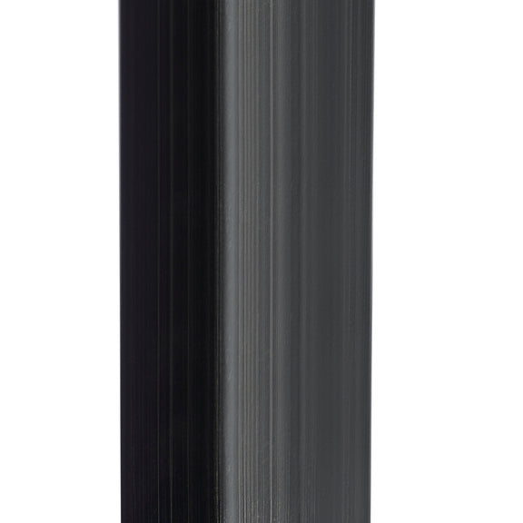 Black cylindrical object with a reflective surface on a white background
