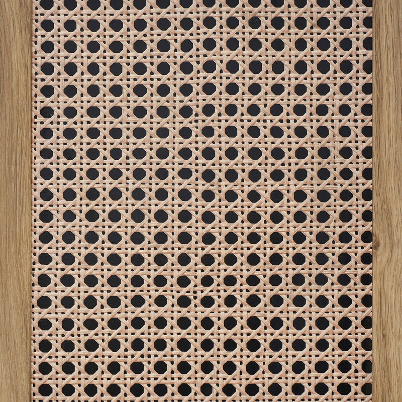 Patterned mat with black dots on a beige background