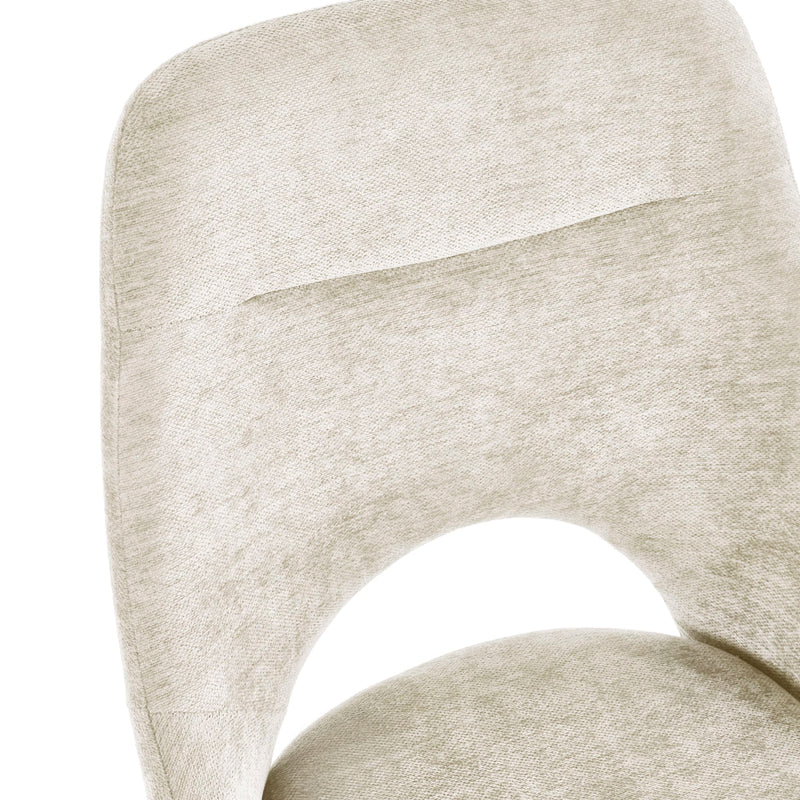 Close-up of a beige upholstered chair with a textured fabric finish on a white background