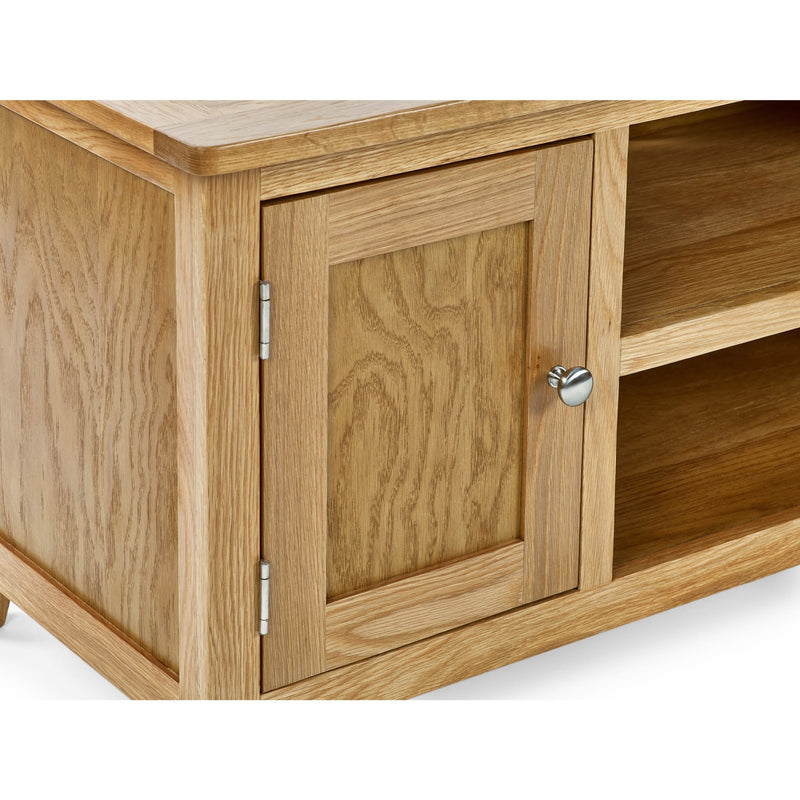 Wooden cabinet with a door and open shelf on a white background