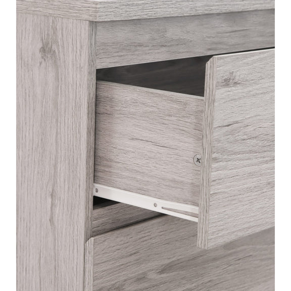 Wooden drawer with a metallic handle on a white background