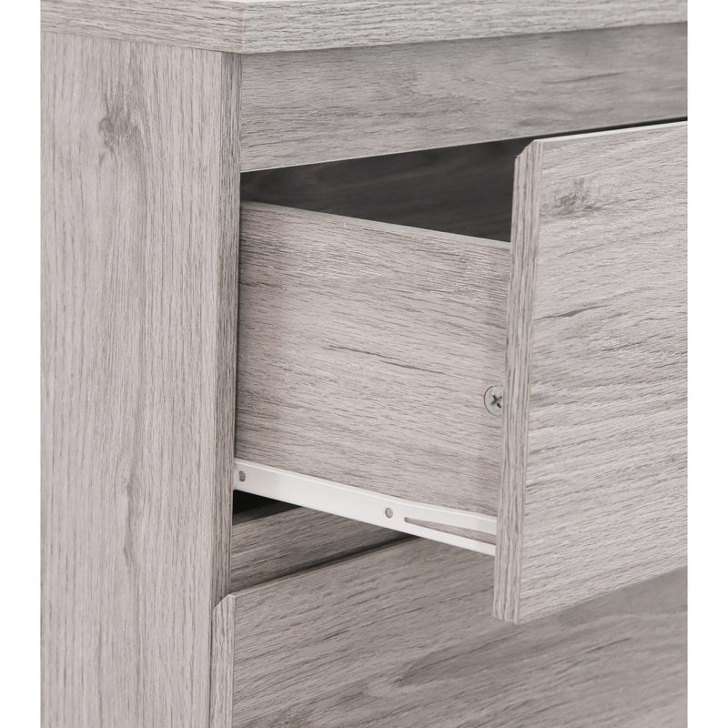 Wooden drawer with a metallic handle on a white background