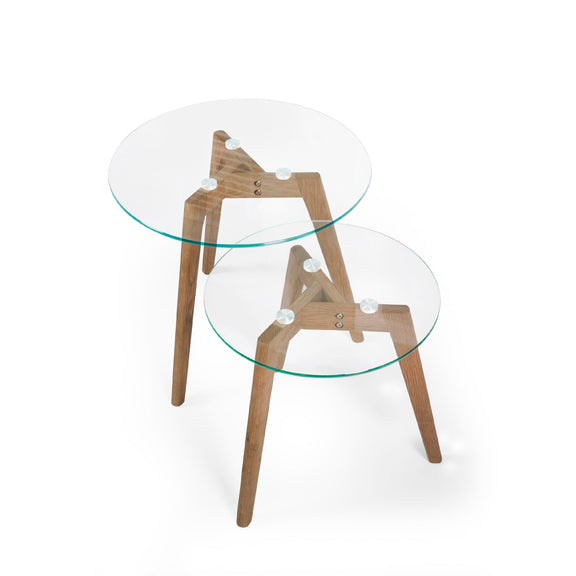 Two glass tables with wooden legs on a white background